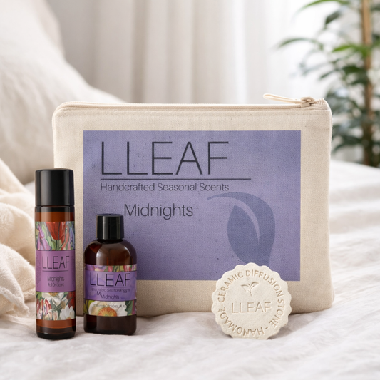 LLeaf handcrafted seasonal scents packaging with diffuser and oils on a soft surface.