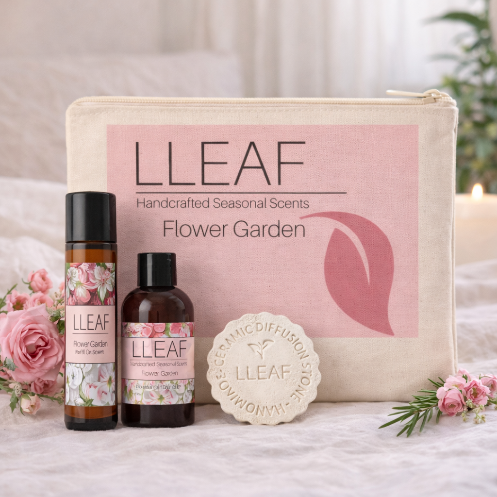 LLLEAF product set with bottles, pouch, and soap on a soft surface with flowers.