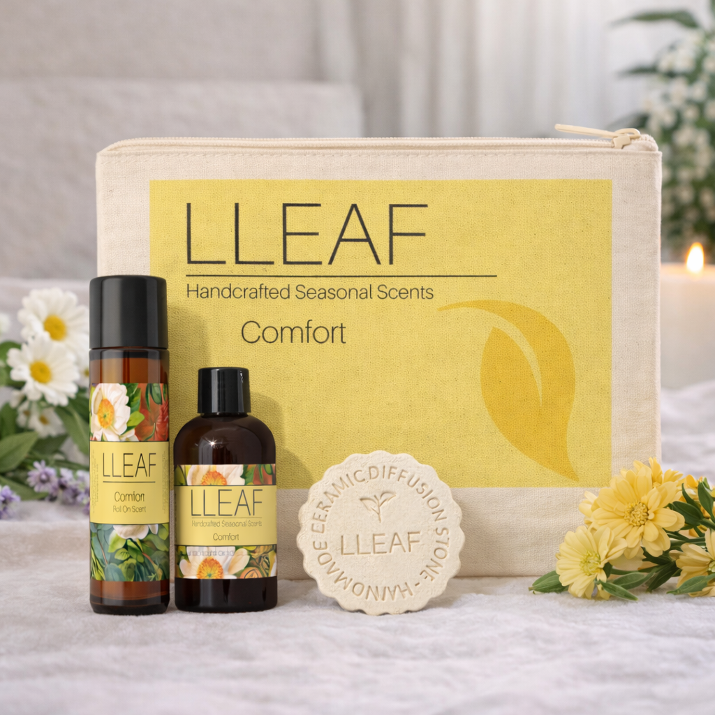 LLEAF product set including bottles, a pouch, and soap on a soft surface with flowers in the background