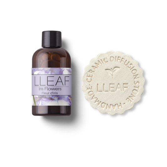 LLEAF bottle and ceramic diffuser stone on a white background