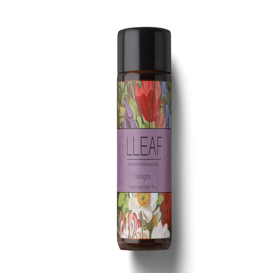 Bottle with colorful label featuring floral designs on a white background