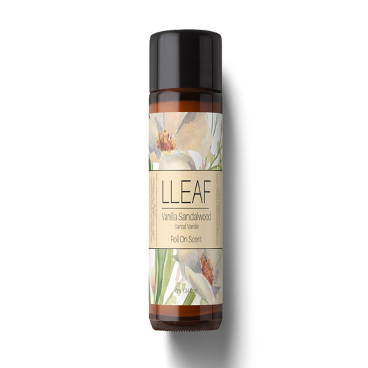 Roll-on bottle of LLEAF Vanilla Sandalwood scent on a white background